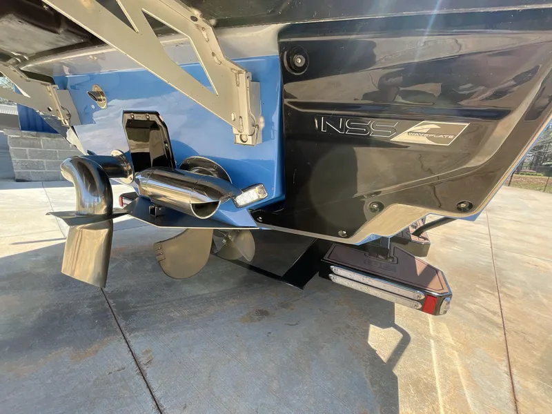 Slide: The Image of 2025 Nautique Super Air Nautique G25 boat stern with propeller and NSS system. - 7