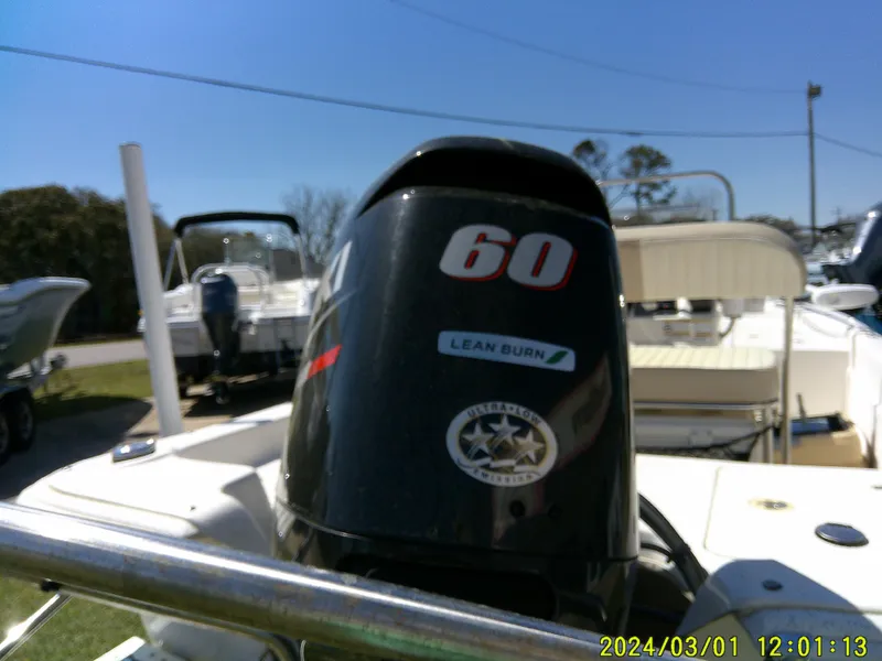 Slide: The Image of 2016 Carolina Skiff JVX16 with 60 HP engine, Lean Burn technology, outdoor display. - 11