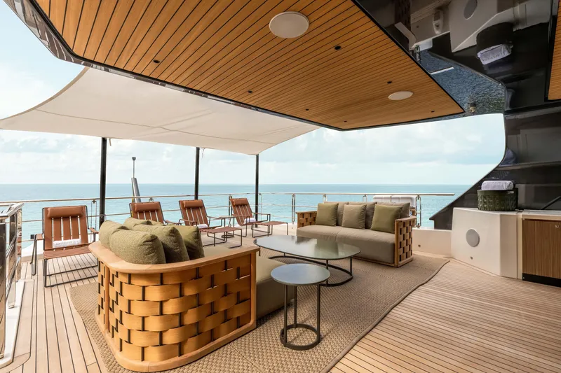 Slide: The Image of Luxurious 2025 Alpha Squalo Co Ownership yacht deck with elegant seating and ocean view. - 50