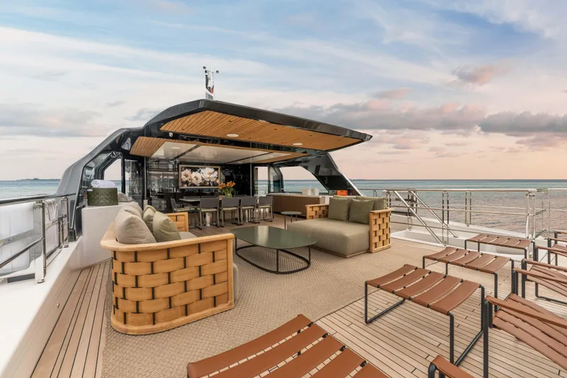 Slide: The Image of Luxurious 2025 Alpha Squalo Co Ownership yacht deck with modern seating and ocean view. - 51