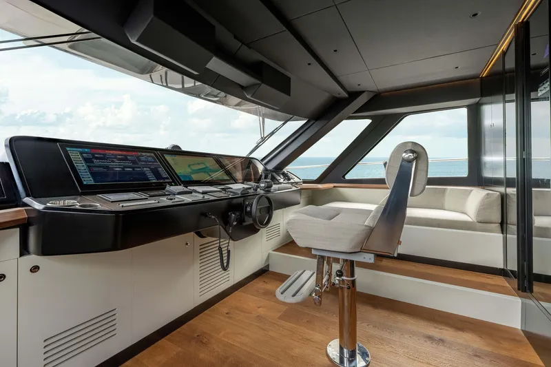 Slide: The Image of Modern yacht cockpit with advanced controls, featuring Alpha Squalo Co Ownership 2025 model. - 53