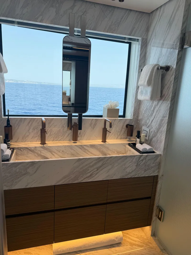 Slide: The Image of Luxurious bathroom with ocean view in 2025 Alpha Squalo Co Ownership yacht. - 6