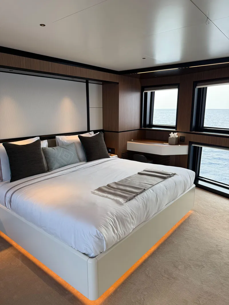 Slide: The Image of Luxurious bedroom on 2025 Alpha Squalo Co Ownership yacht with ocean view. - 7