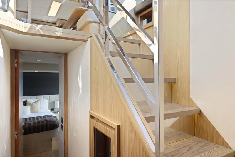 Slide: The Image of Modern yacht interior with wooden stairs and cozy bedroom, Absolute Fly Co Ownership 2015 model. - 25