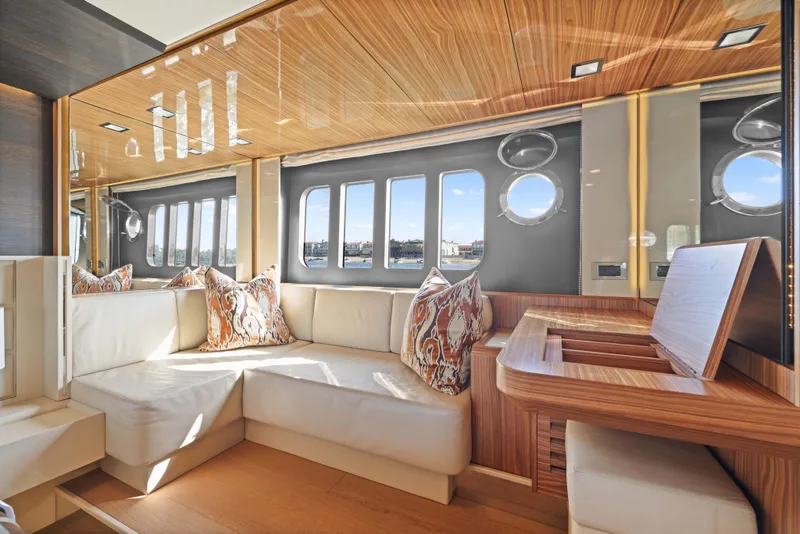 Slide: The Image of Luxurious yacht interior with plush seating and wooden accents, Absolute Fly Co Ownership 2015 model. - 28