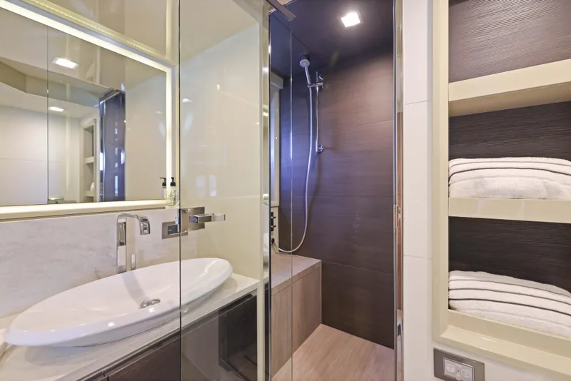 Slide: The Image of Luxurious yacht bathroom with modern shower, sink, and towel storage, Absolute Fly Co Ownership 2015. - 37