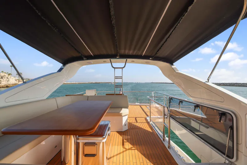 Slide: The Image of Luxurious Absolute Fly Co Ownership yacht deck with seating, table, and ocean view, 2015 model. - 45