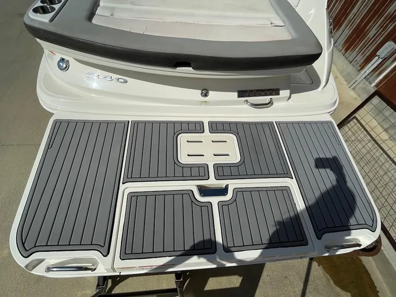 Slide: The Image of 2016 Sea Ray 240 Sundeck swim platform with gray non-slip surface. - 4
