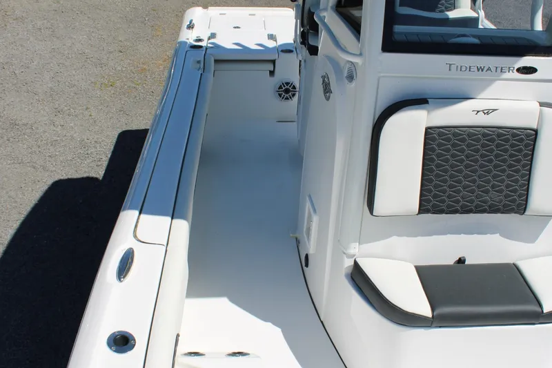 Slide: The Image of 2025 Tidewater 2500 Carolina Bay boat interior with sleek seating and modern design. - 34