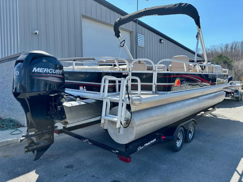 Slide: The Image of 2014 Sun Tracker Fishin' Barge 24 DLX pontoon boat with Mercury outboard motor. - 8