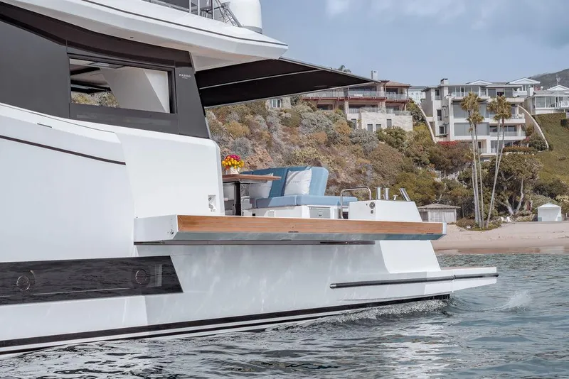 Slide: The Image of 2023 Pardo Yachts Endurance 60 near a coastal landscape, showcasing sleek design and luxury features. - 14