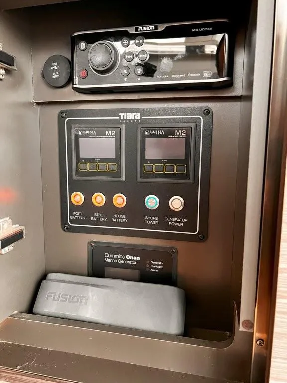 Slide: The Image of Control panel of a 2019 Tiara Yachts 490 Coupe with Fusion audio system. - 26