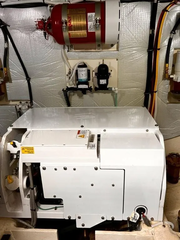 Slide: The Image of Engine room of 2019 Tiara Yachts 490 Coupe with fire suppression system. - 29
