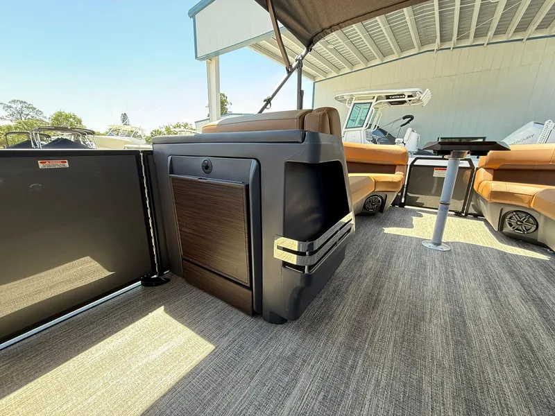 Slide: The Image of 2025 Bennington 24 MSB pontoon boat interior with modern seating and sleek design. - 18