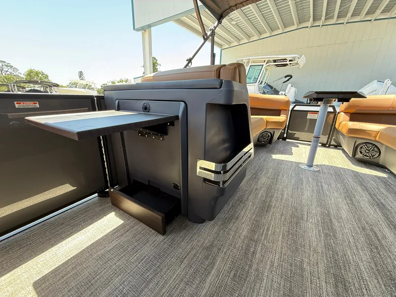Slide: The Image of 2025 Bennington 24 MSB boat interior with seating and storage features. - 20