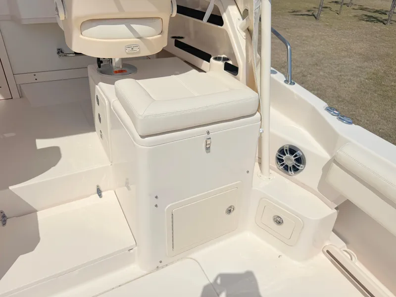 Slide: The Image of 2022 Grady-White Marlin 300 boat interior with seating and storage compartments. - 35