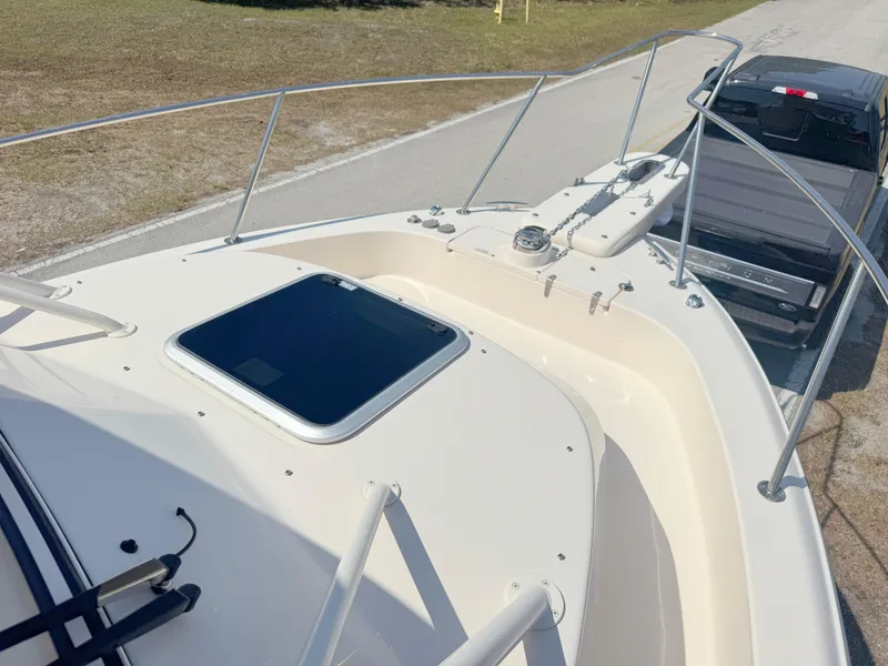 Slide: The Image of 2022 Grady-White Marlin 300 boat on trailer, viewed from bow. - 7