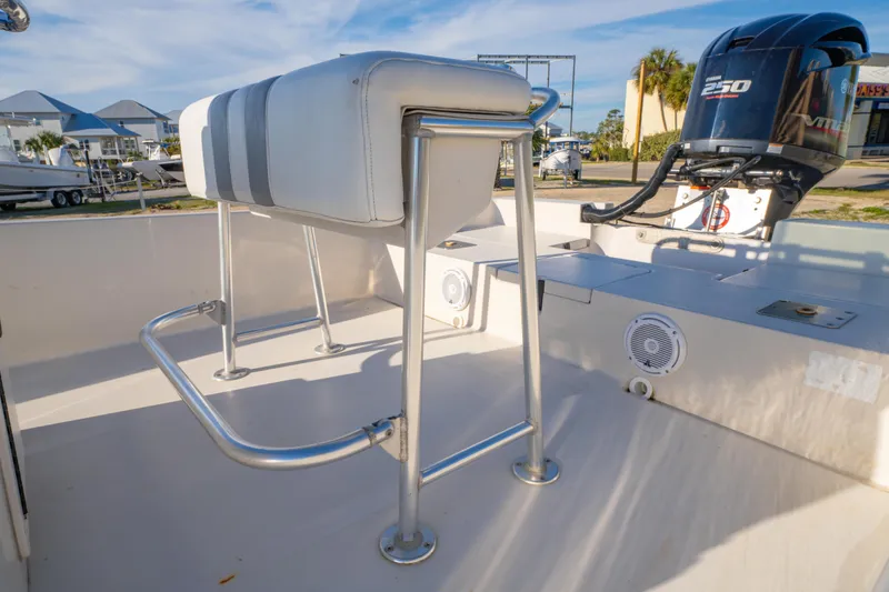 Slide: The Image of 2001 Pathfinder 2400-V boat interior with seating and outboard motor. - 15