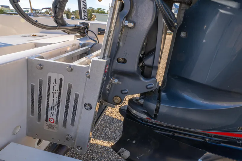 Slide: The Image of Outboard motor mount on 2001 Pathfinder 2400-V boat, featuring Action bracket. - 9