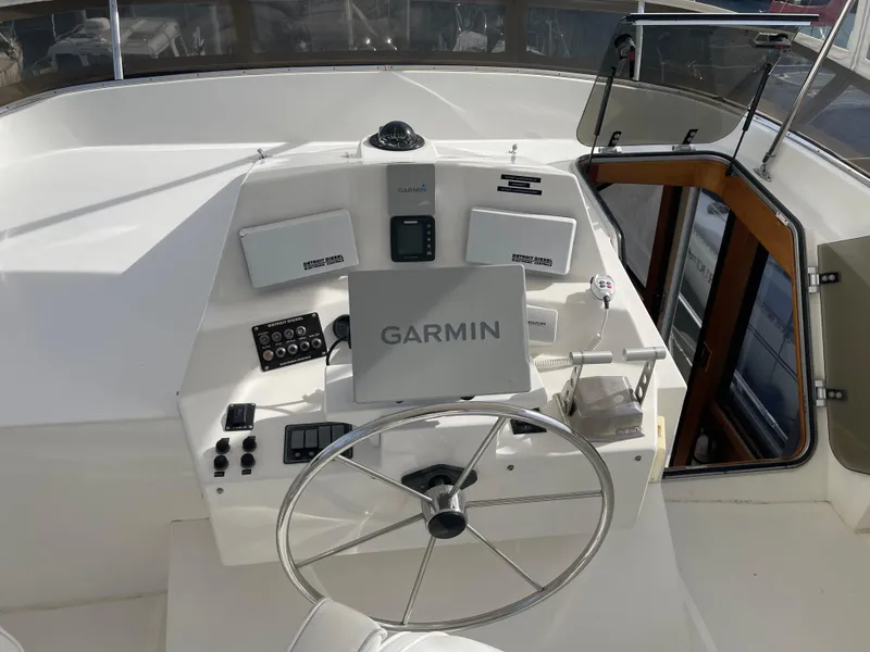 Slide: The Image of Pilothouse of 2002 Canoe Cove 50 Yacht with Garmin navigation system. - 5