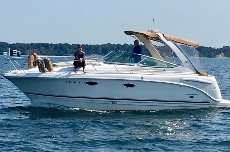 Slide: The Image of 2005 Chaparral Signature 310 boat cruising on a sunny day. - 1