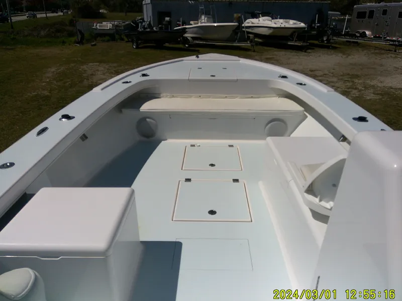 Slide: The Image of 2020 Southern Cross 23 boat interior with seating and storage compartments. - 14