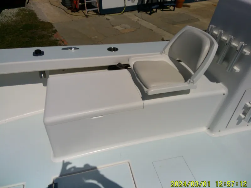 Slide: The Image of 2020 Southern Cross 23 boat seat and storage compartment on deck. - 25