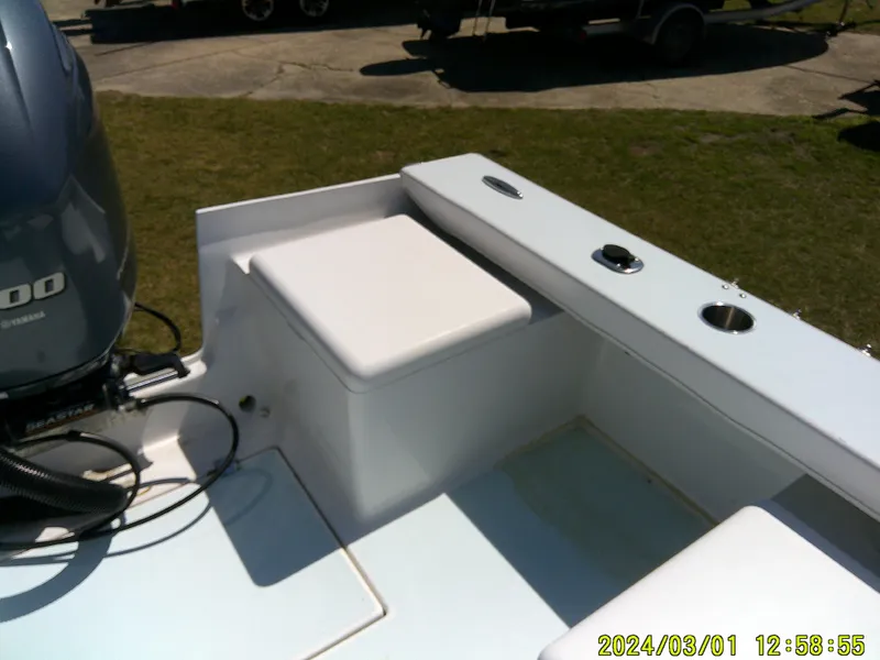 Slide: The Image of Southern Cross 23 boat interior with seating and engine, 2020 model. - 33