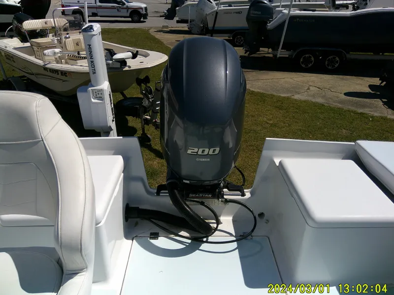 Slide: The Image of Southern Cross 23 boat with Yamaha 200 engine, parked outdoors, 2020 model. - 43