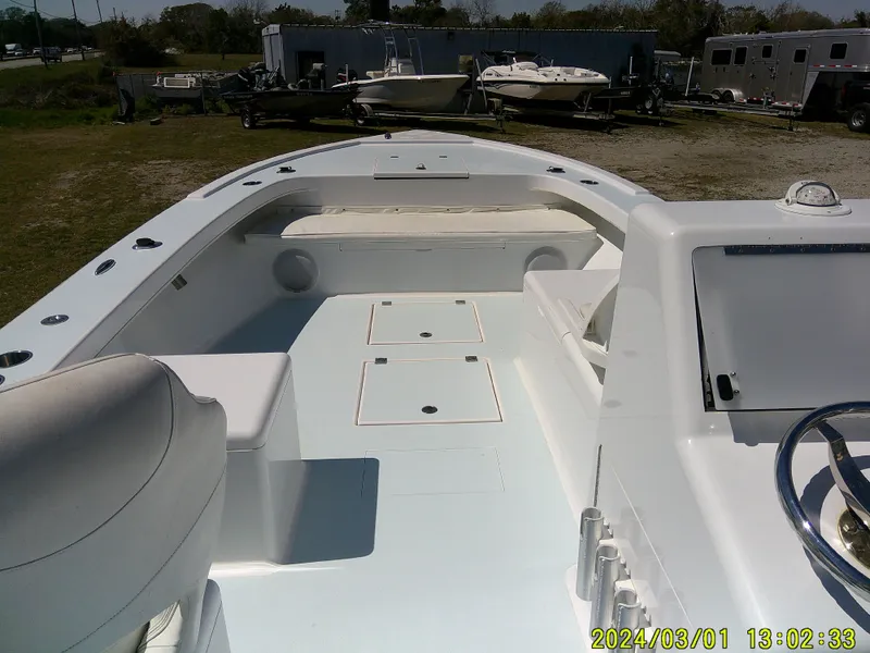 Slide: The Image of Southern Cross 23 boat interior, 2020 model, featuring spacious seating and storage compartments. - 46