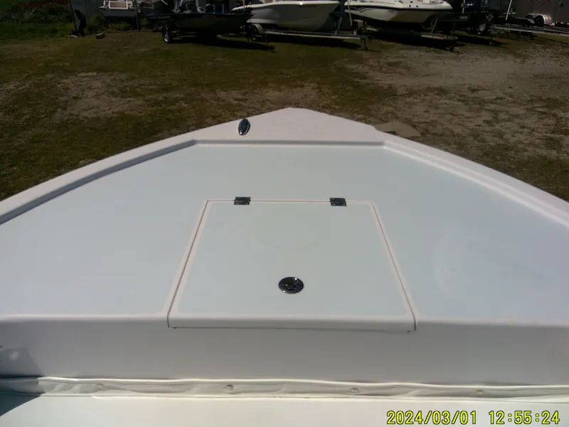 Slide: The Image of Bow of 2020 Southern Cross 23 boat on land, featuring storage hatch. - 7