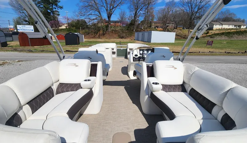 Slide: The Image of 2017 Bennington R5 2550 RCFS Saltwater Edition pontoon boat with spacious seating and modern design. - 9
