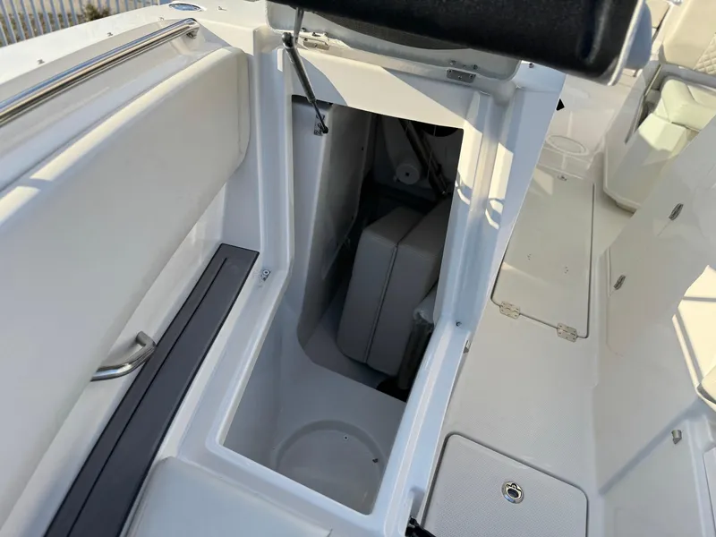 Slide: The Image of 2024 Sailfish 276 DC boat interior storage compartment, open and spacious design. - 10