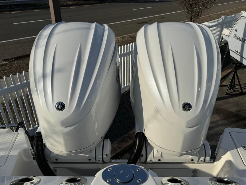 Slide: The Image of Twin Yamaha outboard engines on a 2024 Sailfish 276 DC boat. - 19