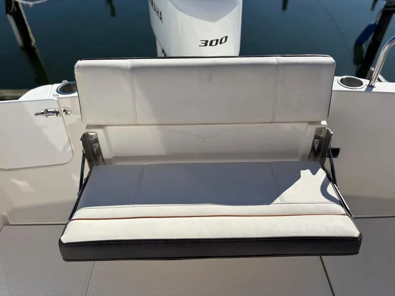 Slide: The Image of 2017 Cutwater C-242 Sport Coupe boat seat with Yamaha 300 engine in background. - 6
