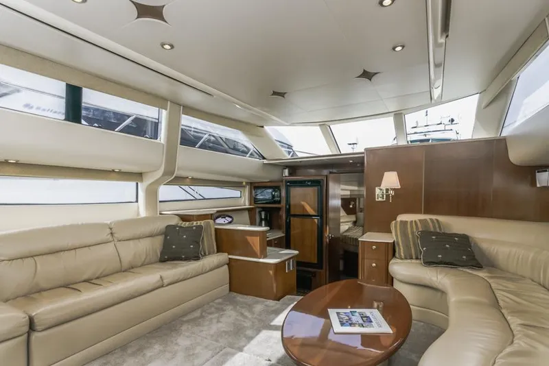 Slide: The Image of Luxurious interior of 2005 Meridian 459 Motoryacht with plush seating and elegant decor. - 36