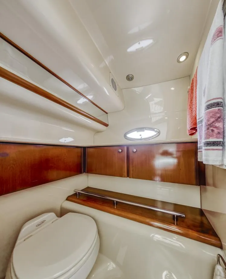 Slide: The Image of 2005 Meridian 459 Motoryacht bathroom with wood accents and modern fixtures. - 41
