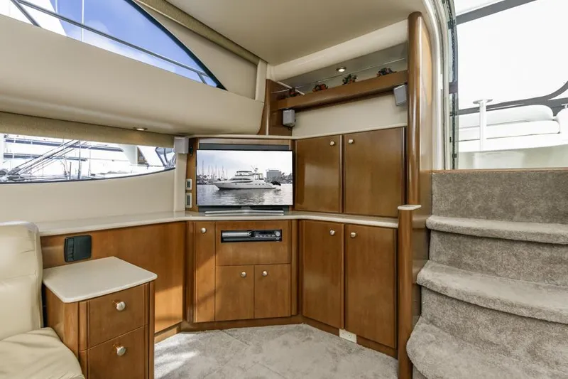 Slide: The Image of Luxurious interior of 2005 Meridian 459 Motoryacht with wooden cabinetry and carpeted stairs. - 45