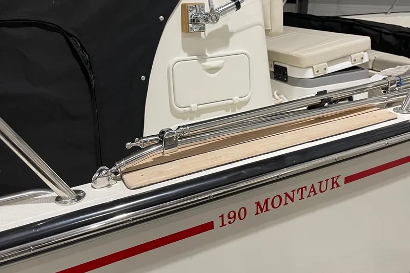 Slide: The Image of 2024 Boston Whaler 190 Montauk boat detail with seating and equipment. - 16