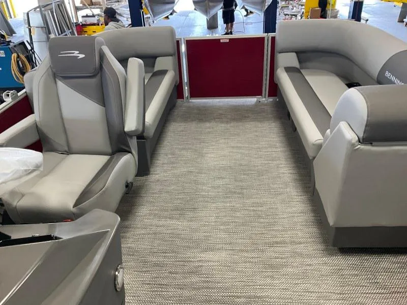 Slide: The Image of 2024 Bennington 20 SVSR SPS pontoon boat interior with gray seating and carpet. - 8