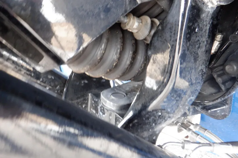 Slide: The Image of Close-up of 2018 Four Winns HD200 boat engine components, showcasing mechanical details and structure. - 10