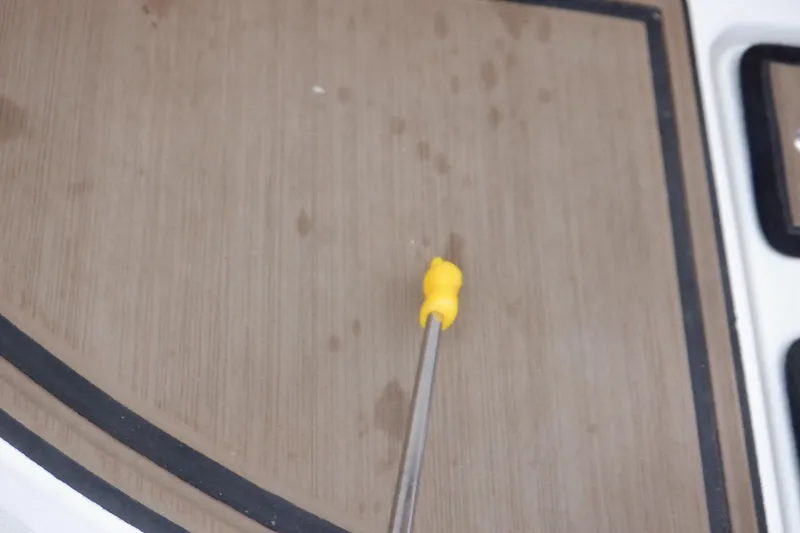 Slide: The Image of Yellow tool on Four Winns HD200 boat deck, 2018 model. - 46