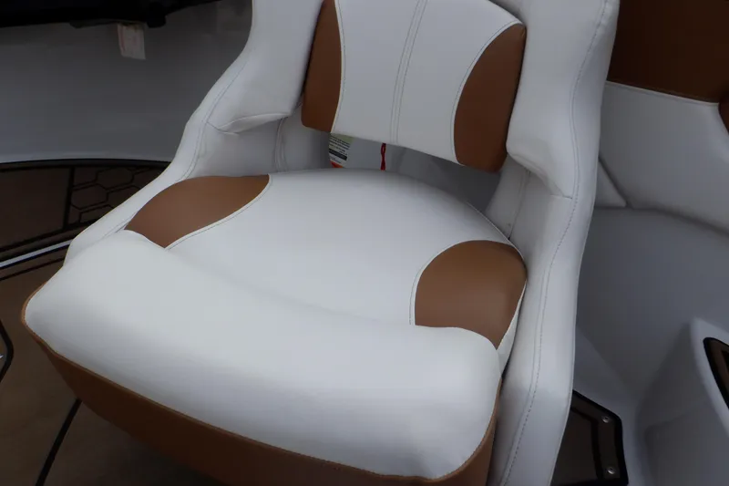 Slide: The Image of 2018 Four Winns HD200 boat seat with white and brown upholstery. - 49
