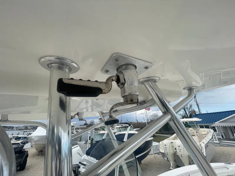 Slide: The Image of 2017 Regulator 23 FS boat with stainless steel T-top and rod holder. - 15