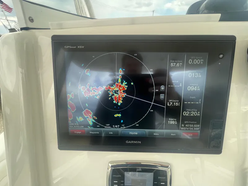 Slide: The Image of Garmin GPS display on 2017 Regulator 23 FS boat, showing radar and navigation data. - 20