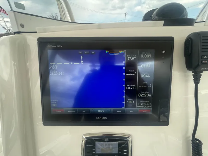 Slide: The Image of Garmin GPS display on 2017 Regulator 23 FS boat dashboard. - 21