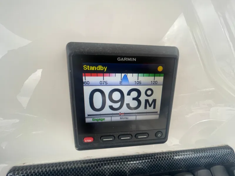 Slide: The Image of Garmin display on 2017 Regulator 23 FS boat showing 093 meters in standby mode. - 23