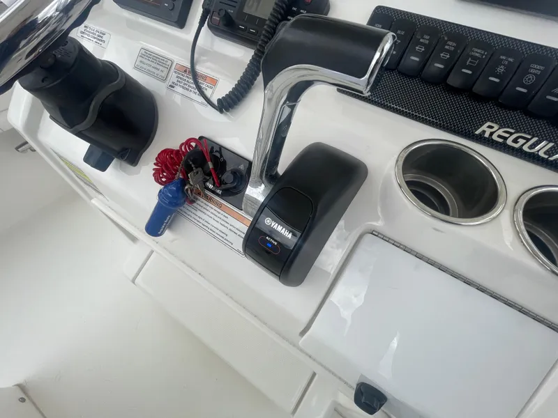Slide: The Image of 2017 Regulator 23 FS boat console with Yamaha throttle and control panel. - 30