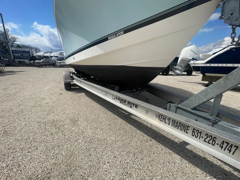 Slide: The Image of 2017 Regulator 23 FS Center Console boat on trailer at Kehl's Marine. - 48