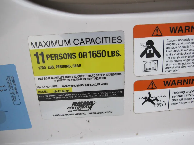 Slide: The Image of Capacity label for 2005 Four Winns 194 Funship: 11 persons or 1650 lbs. - 11